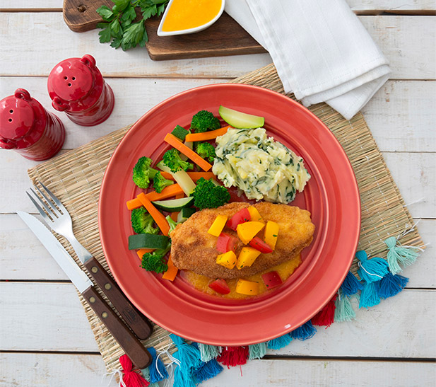 Pollo apanado en salsa de durazno y cilantro