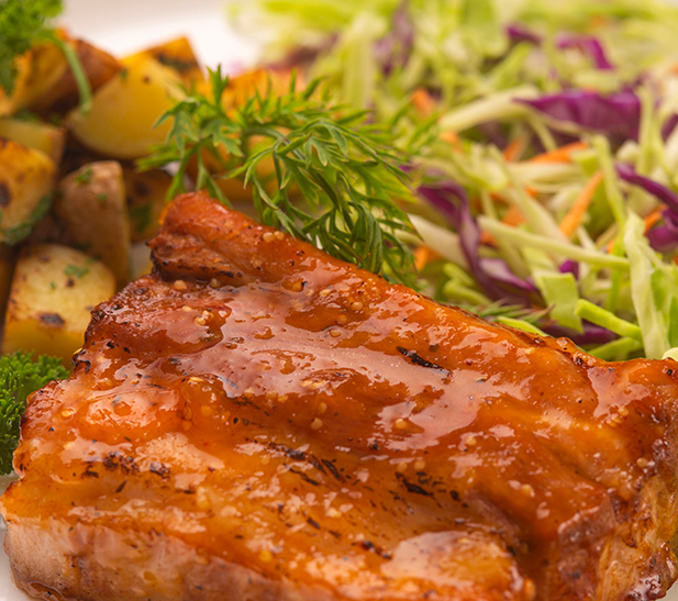 Costillas de cerdo Glaseadas con salsa de Uvillas