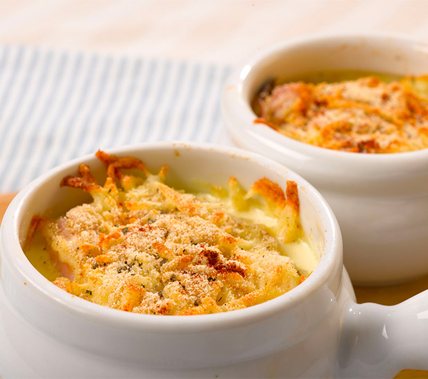 Palmitos gratinados con jamón